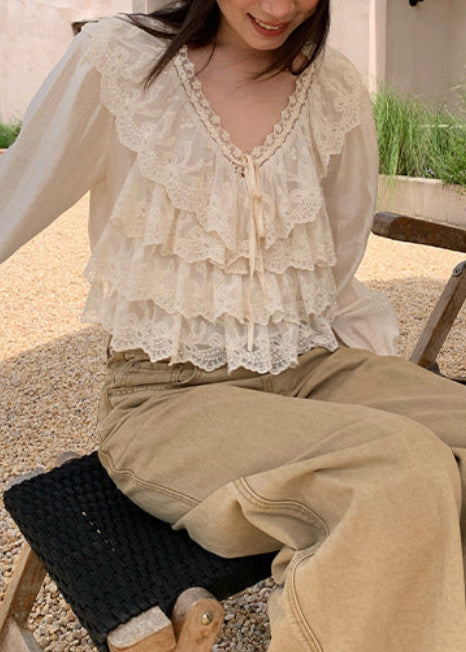 Vネックフリンジブラウス