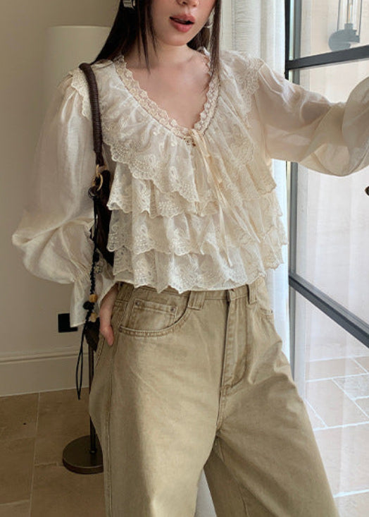 Vネックフリンジブラウス